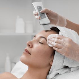 beautician-doing-face-beauty-routine-female-client