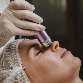 young-woman-having-cosmetic-treatment-wellness-center young-woman-having-cosmetic-treatment-wellness-center